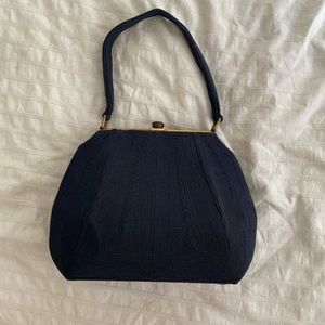 Vintage structured textured handbag clutch